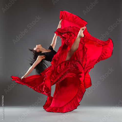 Fototapeta na wymiar Red dress and dance emotions
