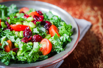 Wall Mural - Kale and edamame salad on rustic background