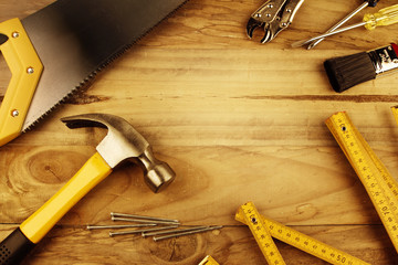 Canvas Print - Assortment of carpentry work tools on wooden table. Copy space