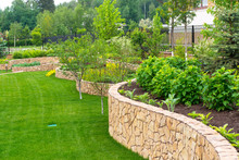Landscape Design In Home Garden, Landscaping In Backyard Or Yard Of Residential House