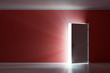 Rays of light through the open white door on red wall