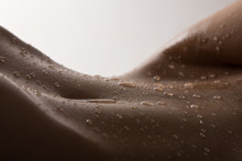 Bodyscape Of A Nude Woman With Wet Stomach And Back Lighting Art