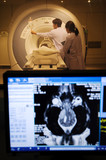 Fototapeta  - veterinarian doctor working in MRI  room with moniter foreground