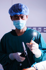 Wall Mural - veterinarian doctor in operation room (art lighting shot)