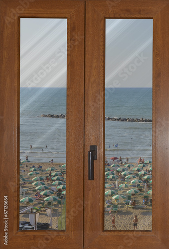 Plakat na papierze fotorealistycznym Okno z widokiem na plażę