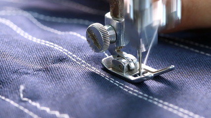 Wall Mural - Woman working with sewing machine, Close up HD Clip.