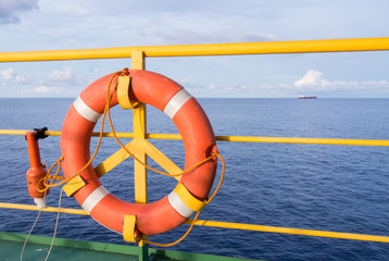 Wall Mural - lifebuoy in rig platform of oil and gas industry in ocean after