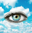 © irishmaster - Beautiful blue human eye with bright sky - Spiritual concept