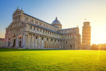 Pisa leaning tower and cathedral at sunrise