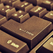 intro key of a computer keyboard, with a retro effect