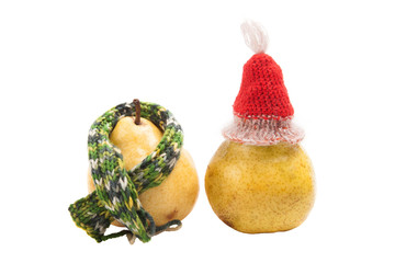 Wall Mural - pears in a scarf and cap isolated on white background