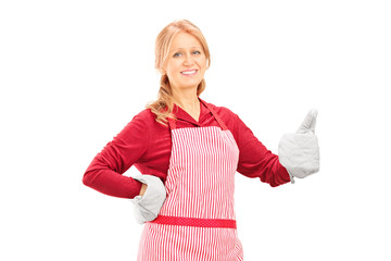 Poster - Woman with cooking gloves giving a thumb up