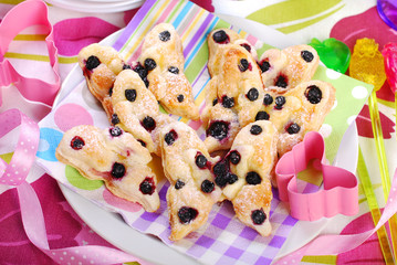 Wall Mural - butterfly shaped puff pastry cookies with blueberry