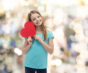 Canvas Print - smiling little girl with red heart