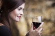 Elegant glamour woman with glass of red wine