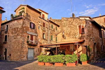 Fototapete - Outdoor cafe in the picturesque old town of Orvieto, Italy