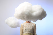 Girl With Her Head In The Clouds