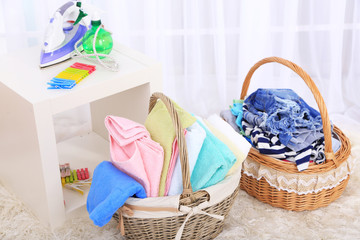 Wall Mural - Colorful towels and clothes in baskets