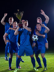 Wall Mural - soccer players celebrating victory