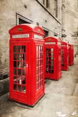 Fototapete - rote Telefonzellen in London mit antiker Textur