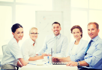 Poster - business team having meeting in office