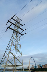 high voltage power line with st louis skyline