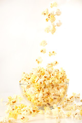 Wall Mural - Popcorn in glass bowl isolated on white