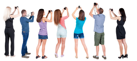 Poster - Back view group of people photographed attractions.