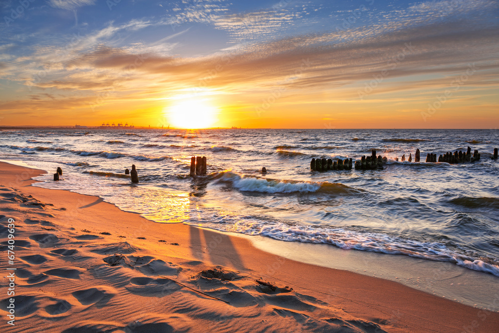 Sunset on the beach at Baltic Sea in Poland - obrazy, fototapety, plakaty 