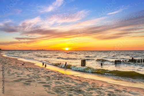 Obraz w ramie Sunset on the beach at Baltic Sea in Poland