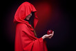 beautiful woman with red cloak holding apple