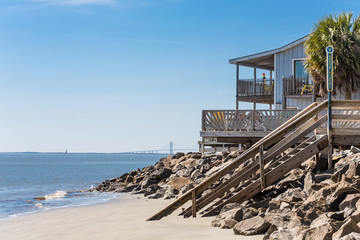 Canvas Print - Beach House with Bridge in Background