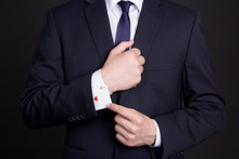 Businessman With Ace Card Hidden Under Sleeve