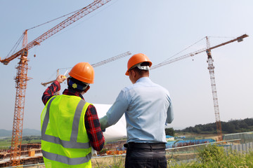 Canvas Print - Construction site, construction workers