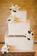 Ivory Square Layered Wedding Cake with Flowers