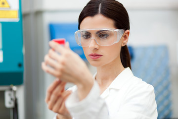 Poster - Female scientist at work in a laboratory