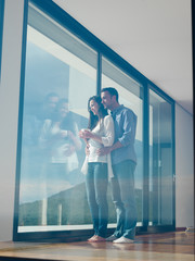 Wall Mural - relaxed young couple at home