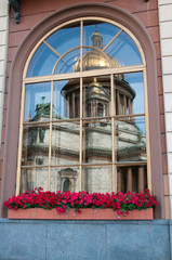 Fototapete - Window with reflection of St Isaac Cathedral, Russia