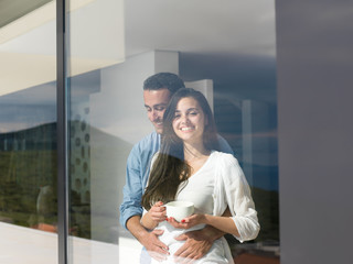 Wall Mural - relaxed young couple at home