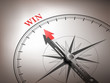 © JoyImage - abstract compass needle pointing the word win