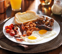 English Breakfast With Eggs, Tomatoes, Mushrooms, Bacon, Beans,