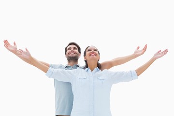 Poster - Cute couple standing with arms out