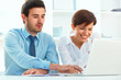 © puhhha - Smiling business people working together in the office