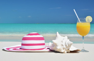 Wall Mural - Hat and orange juice. Exuma, Bahamas