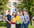 © Syda Productions - group of smiling students standing