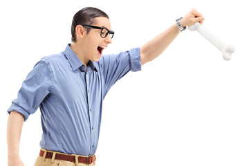 Poster - Young man holding a bone