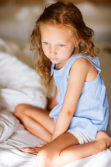 sweet little girl in light blue pajama