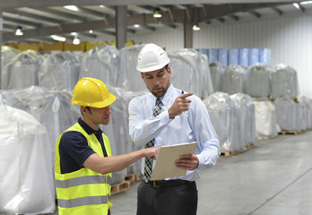 Teamwork - Manager and workmen of a logistics company