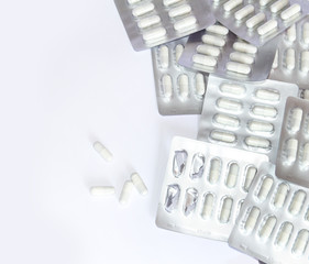 White capsules medicine in foil package