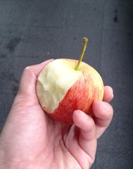 red apple in hand, fresh delicious